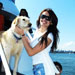 Girl with dog on board the private yacht Miss Toronto